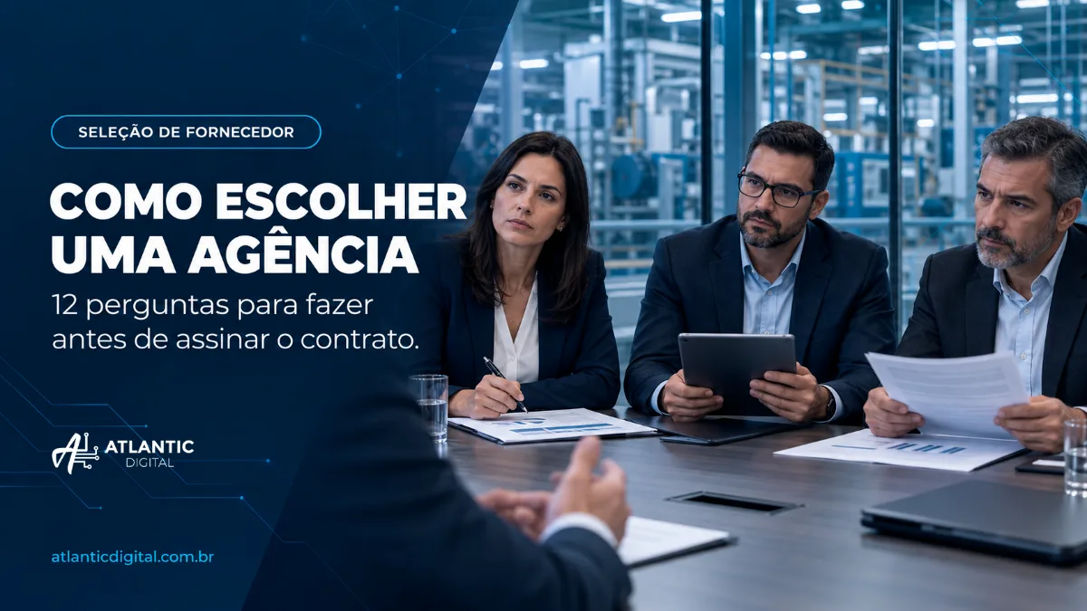 Comitê de compra industrial reunido à mesa com relatórios impressos e tablet, com a fábrica ao fundo